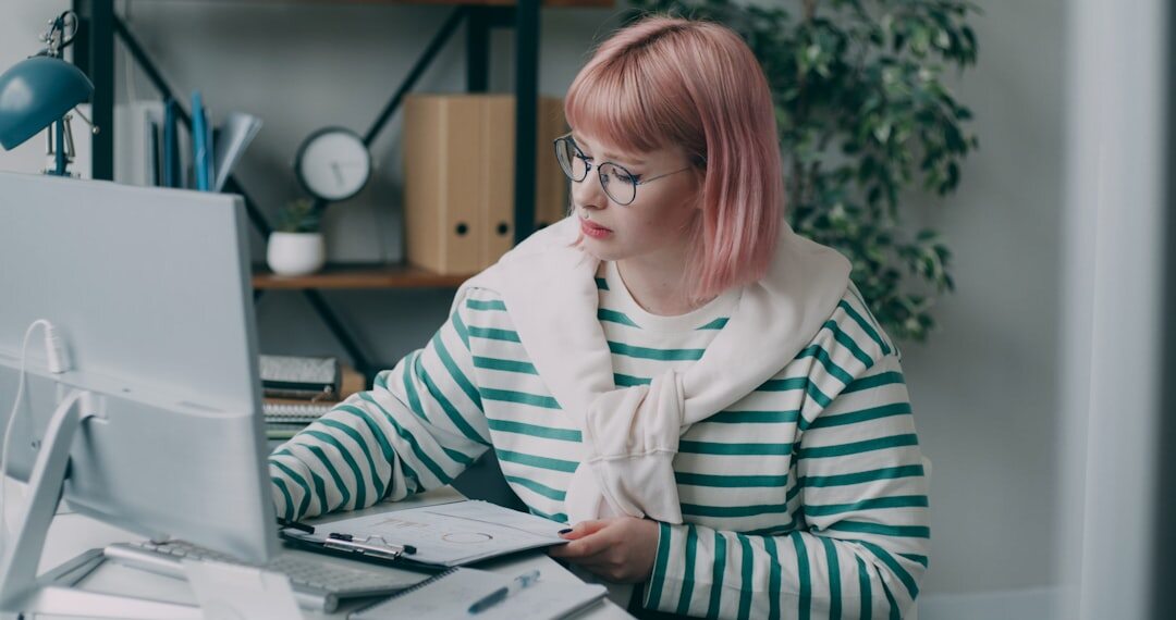 editor reviewing article on screen